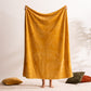 Atmosphera Plaid | Ocher | Fleece plaid with palm leaf pattern | Blanket | 180x230cm